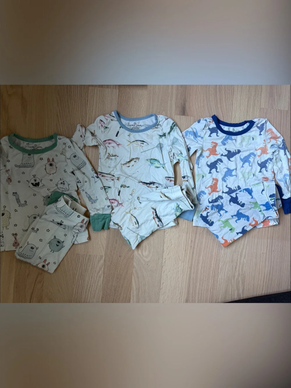 Three PJ sets from Caden Lane - monsters, fish, and Dinos
